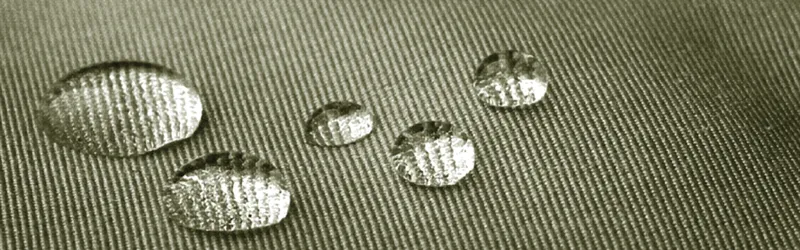 Water drops beading on a Fiber ProTector treated twill fabric