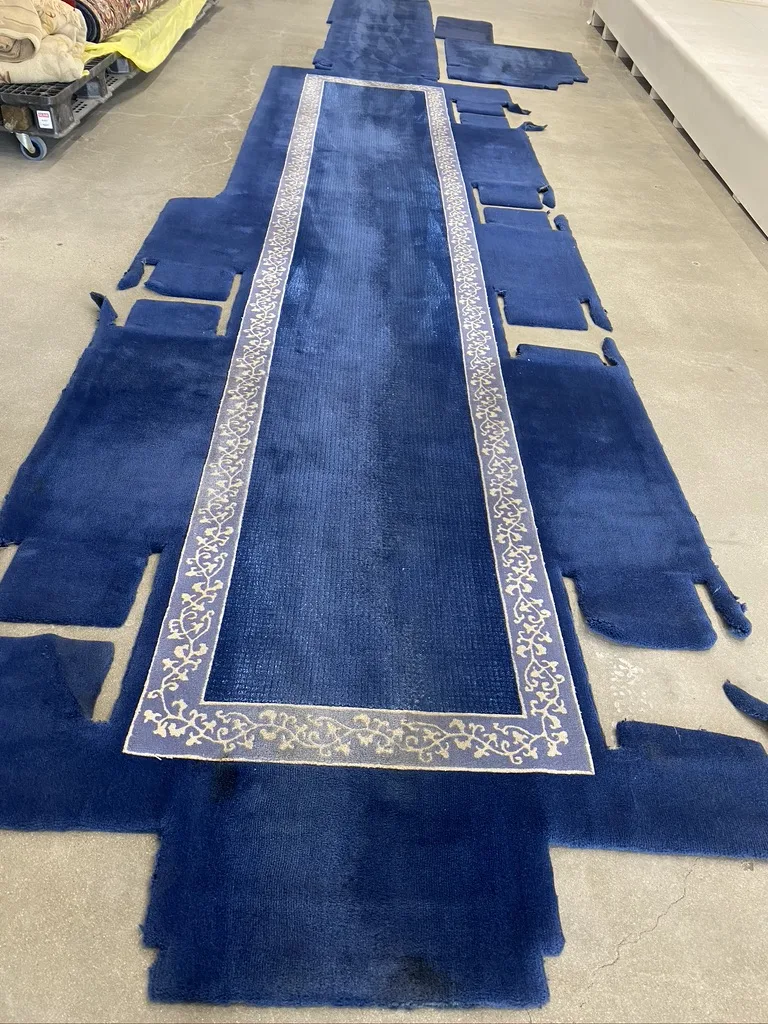 A Gulfstream cabin carpet set laid out at the Fiber Specialties facility for restoration