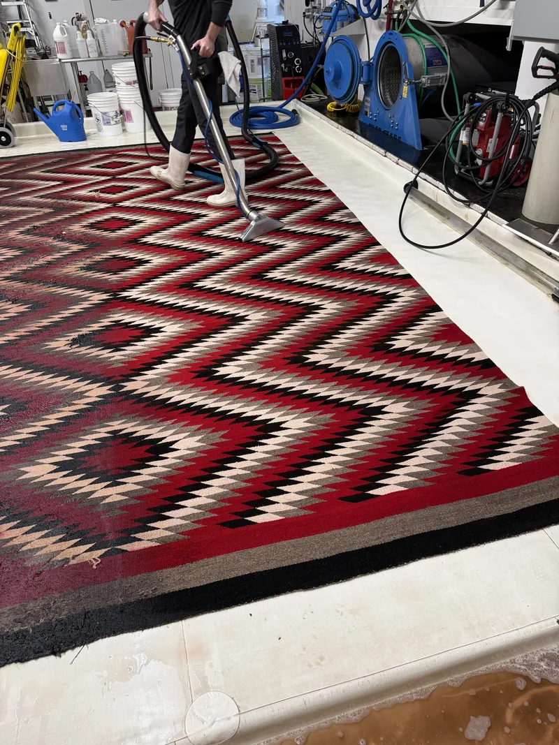 A wool Navajo eyedazzler rug during its full-immersion wash at the Fiber Specialties Boise facility