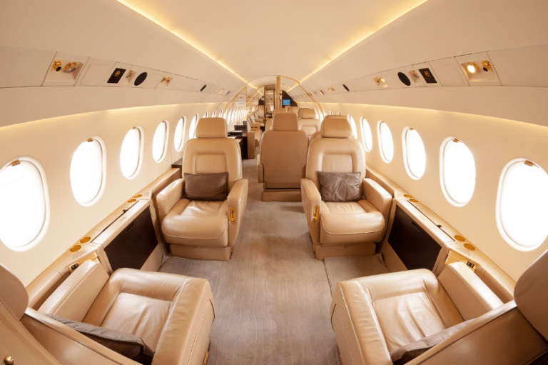 A luxurious private jet interior featuring custom aviation carpets for an elegant experience.