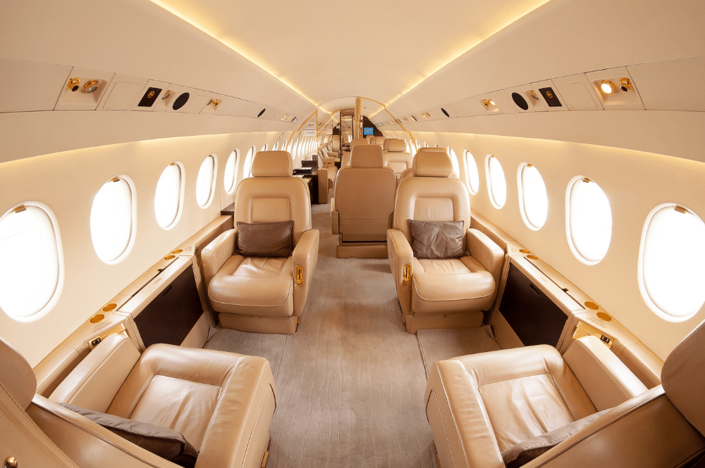 A luxurious private jet interior featuring custom aviation carpets for an elegant experience.