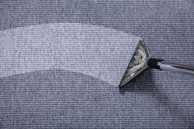 A carpet cleaner using environmentally safe products passes through a carpet.