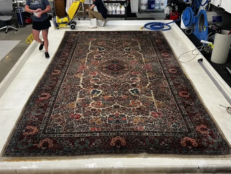 A room size hand-knotted Persian rug on the wash floor at the Fiber Specialties Boise facility